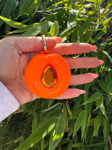 GB BAGCHARM XL (neon orange & orange on gold).