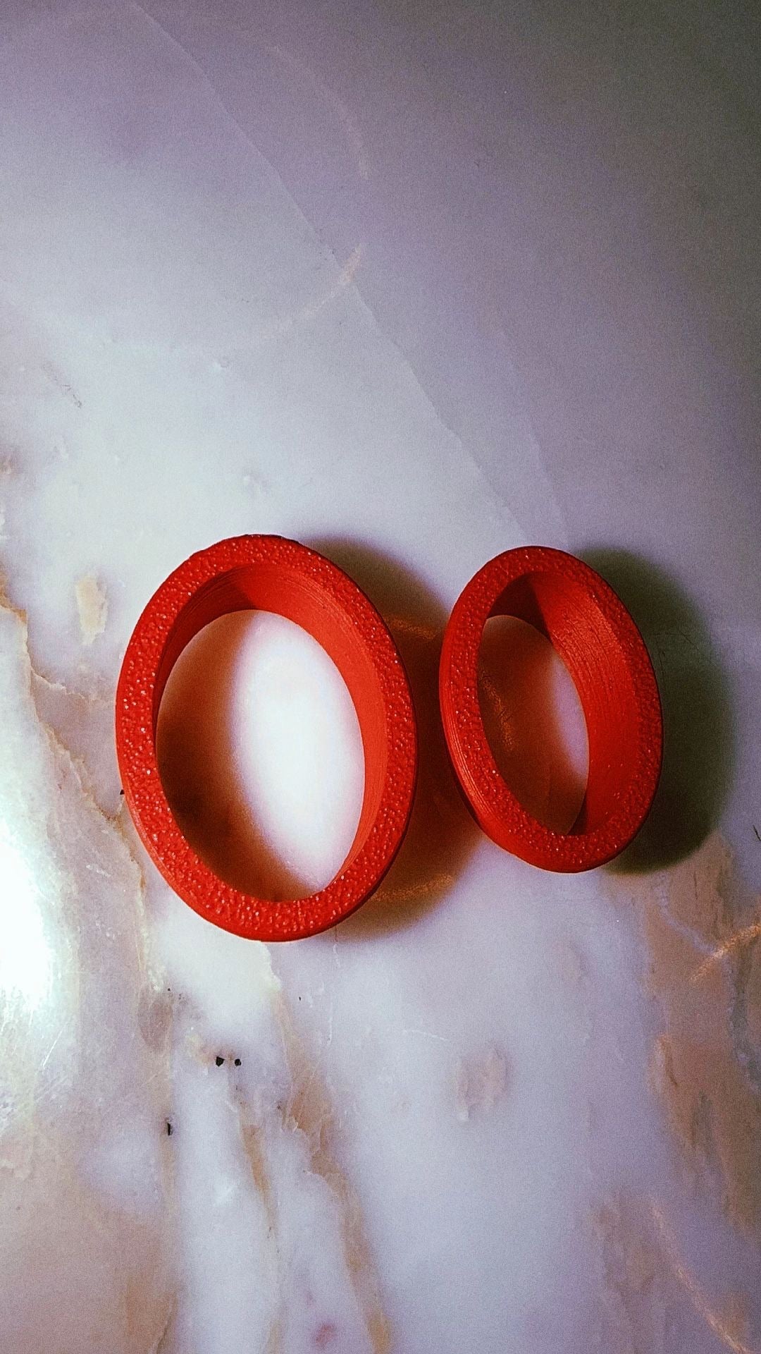 Two oval cutters for silver clay on marble